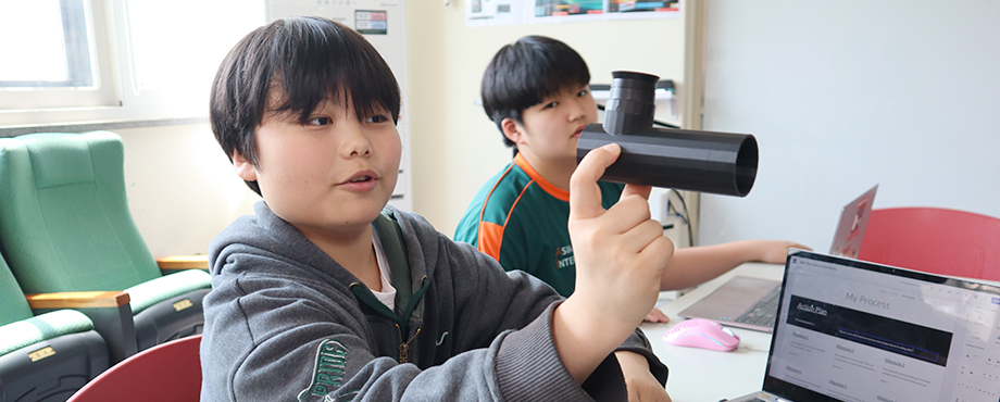 Middle school students exploring personal passions during Genius Hour at APIS